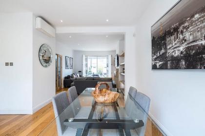 The Porchester Gardens - Modern & Bright 4BDR with Garden and Parking - image 8