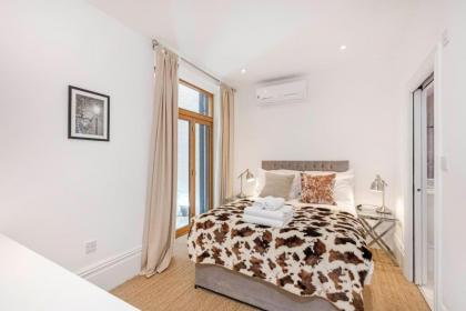 2 bed garden flat with air con by Fulham Broadway - image 10