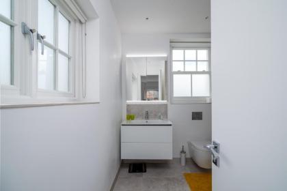 GuestReady - Modern Flat in Fulham - image 20